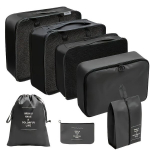 7-osaline reisiorganisaatorite komplekt: sisaldab aluspesu ja kingakotte - valmistatud pol&uuml;estrist. , Juoda