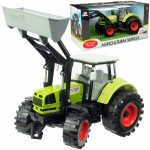 Avatavate uste ja kopaga suur traktor