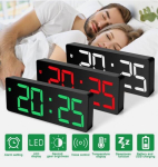 LED-valgusega &ouml;&ouml;lauakell, r&otilde;&otilde;msad inimesed ja