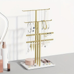 Elegantne kullast ehete alus &ndash; kandikuga metallist hoidik. Rivex