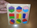 Puidust geomeetriliste kujunditega pusle