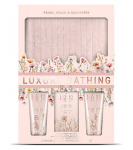 The Luxury Bathing Company Pojengi-, virsiku- ja vaarikaga kehahoolduse kinkekomplekt (4 tk) koos kosmeetikakotiga