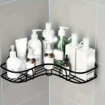 Metallist vannitoa du&scaron;inurk, kolmnurkne, seinale kinnitatav riiul.