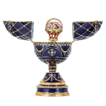 Faberg&eacute; stiilis muusikaline munade ehtekarp lillekorviga