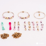 Loominguline ehtekomplekt ripatsite, helmeste, k&auml;ev&otilde;rude ja kaelakeedega