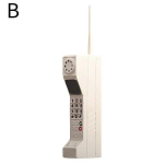 Klassikaline vana vintage v&auml;listingimustes kasutatav retrotelliskivi kahe simusega mobiiltelefoni mudel