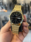 Meeste k&auml;ekell Casio kuldne musta sihverplaadiga TY52888