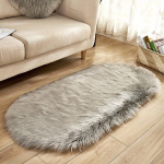 Superpehme ovaalne vaip, kunstlambanahk p&otilde;randamatid., pilka