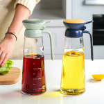 K&ouml;&ouml;git&ouml;&ouml;riistad Toidu&otilde;li dosaator &ndash; k&ouml;&ouml;gis kasutamiseks m&otilde;eldud klaaspudel