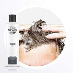 H&otilde;renevate juuste naturaalne hoolduskomplekt Nioxin System 2: &scaron;ampoon 150 ml + juuksepalsam 150 ml + seerum 40 ml