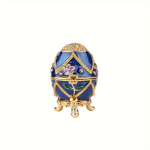 K&auml;sitsi maalitud peen v&auml;ike sinine Faberge muna karp lillemustriga.
