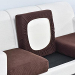 M&ouml;&ouml;blikatted, veniv v&otilde;rega diivanipadja kate, maisifliisist tugitooli kate, tume kohv