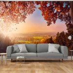 Fototapeet Artgeist Autumn delight - sunny landscape with countryside surrounded by trees and fields, 70 cm x 100 cm