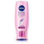 NIVEA Hairmilk Natural Shine taastav palsam - 200 ml.