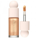 Rare Beauty Positive Light &scaron;ķidrais izgaismotājs Exhilarate 15ml