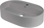 Granite countertop washbasin with a faucet island - oval