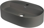 Granite countertop washbasin with a faucet island - oval