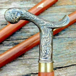 Antiikne messingist vintage peak&auml;epide, viktoriaanlikus stiilis puidust pruun jalutuskepp, kolm korda volditud