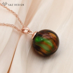 Moodne roosa kullav&auml;rvi &uuml;mmargune akr&uuml;&uuml;lhelmestega ripats kaelakee naistele pulmapeo elegantsed ehted