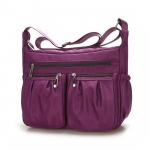 Uued naiste moodsad &otilde;lakotid naistele Designer veekindel nailonist k&auml;ekott T&otilde;mblukuga rahakotid Messenger Crossbody kott 26*9*20cm lilla