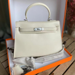 Kvaliteetne karbinahast minikott teise p&otilde;lvkonna kott Uus nahast &otilde;lakott Moodne crossbody-kott naistele 22x7x15cm valge