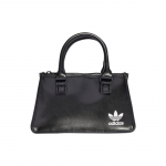 Adidas Originals Ristik X KSENIASCHNAIDER &Uuml;hiselt kaubam&auml;rgistatud Seeria Kunstnahast K&auml;ekott Tavaline Naiste Must Adidas IJ7481 must