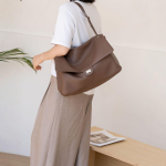 2026 Naiste k&otilde;rgekvaliteediline ehtsast nahast &otilde;la- ja crossbody kott 25.5*9*16 CM brown