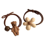 V&auml;rvilised juuksekarvakesed karamelliv&auml;rvilised vibukaru helmed lilled juuksen&ouml;&ouml;r