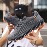 Hingavad lendavad silmkoelised hingavad spordijalatsid Meeste paeltega sportlikud tossud vabaaja meeste kingad 39 hall