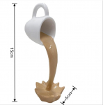 H&otilde;ljuv lekkiv kohvitass skulptuur K&ouml;&ouml;gikaunistus Maagiline pritsmete kallamine Loominguline t&ouml;&ouml;laua sisekujundus Kodukaunistus