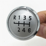 5/6 kiiruse k&auml;iguvahetusnupu varda kaane kork Kiirusenumbri embleemi m&auml;rk Volkswagen VW Transport T5 T5.1 Gp 2003-2011 auto stiilitarvikutele