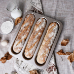 1tk Suur kolme piluga Prantsuse pulk, vastupidav s&uuml;sinikterasest &scaron;ampanja kuldne nakkumatu Prantsuse leivarest k&uuml;psetusplaat Prantsuse pulgavorm Baguette mold kuldne