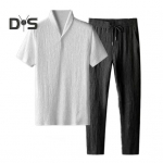 2tk/komplekt Meeste suvine vabaaja riietus rev L&uuml;hikeste varrukatega T-s&auml;rk Elastne n&ouml;&ouml;riga v&ouml;&ouml;koht Pikad p&uuml;ksid Spordir&otilde;ivaste komplekt Jogger spordidress 4XL must valge v&auml;rv