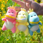 Armas v&auml;ike dinosauruse ripatsnukk pl&uuml;&uuml;sis m&auml;nguasi mini v&auml;ike v&otilde;tmehoidja kott rippuv kaunistus nukk nukk naistele 12Cm