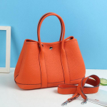 2026 Uus lit&scaron;i mustriga pealmine kiht veisenahast naiste kott K&auml;ekott Ehtne nahk Pehme Aia Crossbody 30cm Litchi Pattern oranž