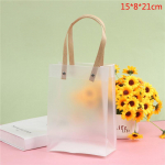 Pooll&auml;bipaistev PVC j&auml;&auml;tunud Pp k&auml;ekott j&otilde;ulukinke pakkimine kommide kinkekott 15*8*21cm