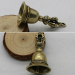 Messingist k&auml;sitsi valmistatud survevalu tilktuulekell Tiibeti pronkskella loominguline 5*2*2cm