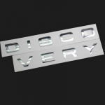 ABS T&auml;hed Discovery Esiosa Kapoti Embleemi Kate Tagumine Pagasiruumi Logo Kleebis Decal Auto Kujundustarvikud Glossy Silver