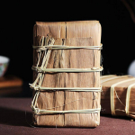 Pu Zi Wei Mengku Ba Nuo vanad lehed vana puu Huang Pian Pu Er toores tee tellis 500g