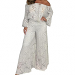 2 tk/komplekt Naiste &uuml;lemised p&uuml;ksid, &otilde;&otilde;nsad pitsid &otilde;lgadest lahtised pikkade varrukatega pluus, lillemuster k&otilde;rge v&ouml;&ouml;kohaga laia s&auml;&auml;rega elastsed taljep&uuml;ksid. M must