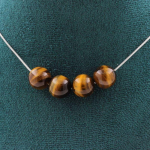 Pierres et Min&eacute;raux. Collier 4 perles Oeil de Tigre 10 mm. Chaine en acier inoxydable Collier femmes, hommes. Taille personnalisabl