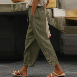 Naiste vabaaja &uuml;hev&auml;rvilised pitsiga &uuml;hendatud disainiga k&otilde;rge v&ouml;&ouml;kohaga n&ouml;&ouml;riga taskutega &uuml;heksa minuti pikkused p&uuml;ksid S