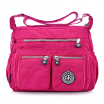 Naiste mood &uuml;hev&auml;rvilised vetth&uuml;lgavad nailonist reisi&otilde;lakott Crossbody kotid punane