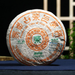 2003 Kong Ming Shani pressitud Qizi kook Yiwu klassikalisest teest Puerh Puer Raw 357g