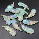 Kodu Peotarbed Helendavad heledad v&auml;rvilised seeriad Akr&uuml;&uuml;l sulgedest ripatsid Aksessuaarid Materjalid UV-kattega V&auml;rv Mood Kaelakee K&otilde;rvar&otilde;ngaste Valmistamine roheline