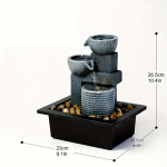 Lauapealne purskkaev l&otilde;&otilde;gastav lauapealne purskkaev siseruumides olev koskusega purskkaev lauale Kontori elutoa kodukaunistus