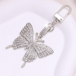 1tk l&auml;ikiv Rhinestone Butterfly v&otilde;tmehoidja armas loomasulamist v&otilde;tmehoidja r&otilde;ngas kott seljakott Charm auto v&otilde;tme ripats k&otilde;rvaklappide &uuml;mbris