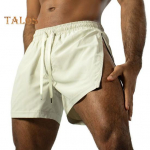 Meeste fitness-p&uuml;ksid k&uuml;ljet&otilde;mblukuga Kiirelt kuivavad hingavad j&otilde;usaalitreeningu l&uuml;hikesed p&uuml;ksid Elastsed v&ouml;&ouml;kohal pingutusn&ouml;&ouml;riga sportlikud jooksuspordip&uuml;ksid S helekollane v&auml;rv