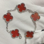 Uus versioon Neljaleheline ristik Viie &otilde;iega k&auml;ev&otilde;ru Naturaalne punane ahhaat Valge p&auml;rlmutter K&auml;ev&otilde;ru Naiste laserk&auml;ev&otilde;ru V Gold