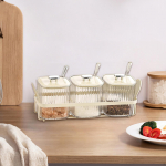 Jaotatud maitseainete maitseainepurk Suhkrukauss kuivatatud puuviljade serveerimisalus kaane ja 3 Grid